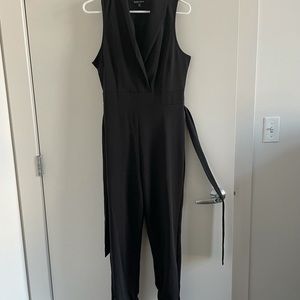 Fitted black jumpsuit, collar, side zipper